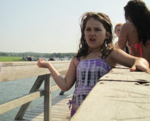 Kayli Gagne, 8, explains the best way to jump off the boardwalk: "I just don't think about it."
