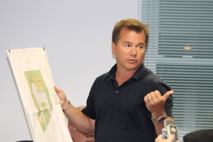 Developer Warren Dalton shows his conceptual plans for the Nimrod property. He wants to build a mixed use development of apartments, retail space and offices. He offered to preserve the 28 x 28 square foot section of the building with a cannonball hole created during the War of 1812.