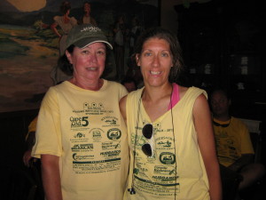 The two women who walked the entire 103.6-mile Housing With Love Walk, Patricia Goggin and Laurie Sexton, pose at the post walk party at Liam Maguire's.