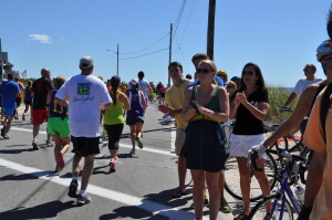 Family and friends of Patrick O'Brien cheer the runners at Surf Drive.