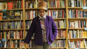 Stephanie Seales as Willy Wonka, who magically picks out books for people