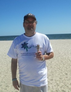 Scott Lowe carries an angel in memory of his wife Michelle, who died of ovarian cancer. 