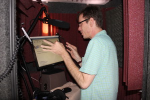 John Taylor, voice actor, in his home studio.