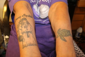 Avant shows her tattoos: Granny Squannit, which is her Native American name, and a turtle.