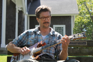 Rob Myers, who is in several Vineyard bands, takes time out for some strumming in Oak Bluffs.