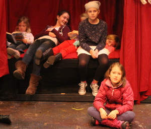Lily Rapoza (sitting), 12, of East Falmouth, plays Narrator #2 in "A Seussified Christmas Carol."