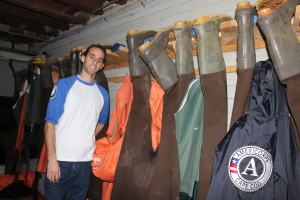 Bourne House Supervisor Adam DeVito, or Walpole,, with some Americorps waders.