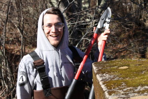 Americorps Cape Cod member Miles Sabine of New Brunswick Canada heading to work on the Quashnet River.