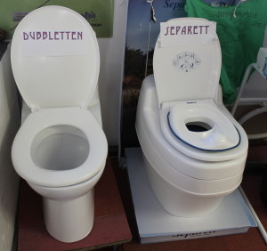 Two eco-toilets at the Cape Cod Eco-Toilet Center in Falmouth. The one on the right has a toddler seat on top.