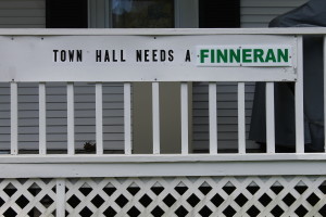 This sign, on Marc Finneran's house in 2014, used to read, "Town Hall Needs An Enema!"