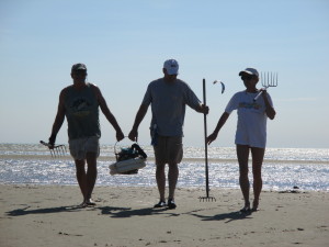 Richard Bolles, Michael Bolles and Karen Bolles after a successful day of clamming on First Encounter Beach in Eastham.