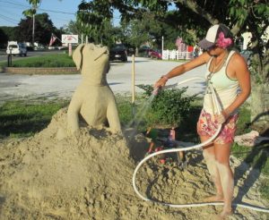 "The water acts like a glue to hold it together," said Morgan Rudluff, professional sand sculptor.