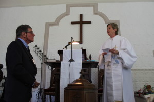 Rev. Fields addresses Paul Rifkin before the baptism.