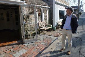 David Dunlap takes a walk down Commercial Street in the spring, pointing out buildings of interest in town. PHOTOS BY LAURA M. RECKFORD/CAPE COD WAVE