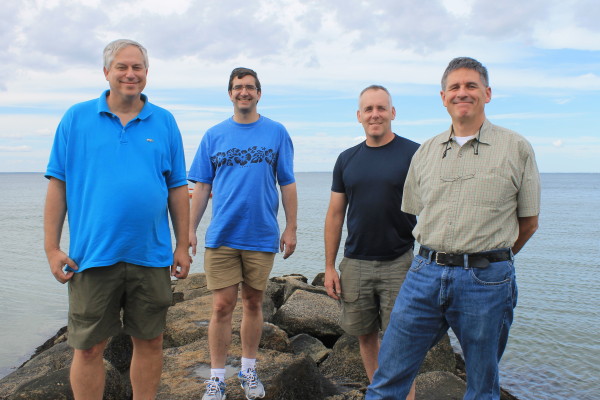 Senior Scientist Glen Gawarkiewicz, Senior Scientist Scott Doney, Associate Scientist Jeff Donnelly, and Senior Scientist Dan McCorkle. The four have received a $1 million grant from the MacArthur Foundation to study climate change.