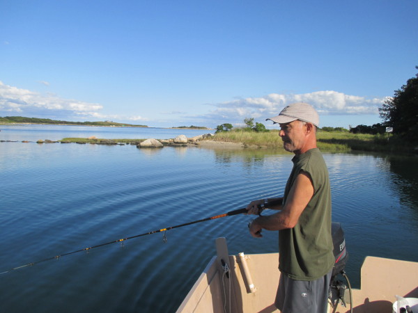 Tuck Hayashi, fishing in the lagoon where he hooked a great white shark ten years ago.