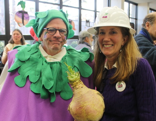 Jack Kerig, as a turnip, and Marianne Sinopoli head of the Eastham Turnip Festival