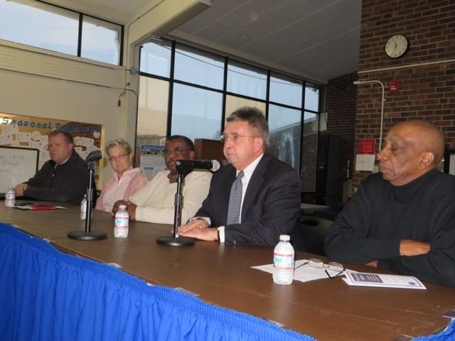 District Attorney Michael O'Keefe, second from right, attends a forum on race and justice at Cape Cod Community College in December 2014. Other panelists were, from left, Mashpee Police Chief Rodney Collins, Barnstable County Human Rights Commission Coordinator Elenita Muniz, Barnstable County Human Rights Commission Chairman John Reed, and Dr. Keith Clarke, member of Concerned Black Men of Cape Cod.