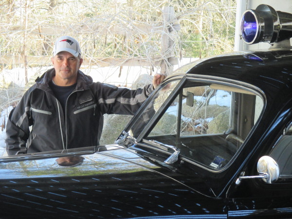 Orleans Police Lt. Kevin Higgins, one of the caretakers of the 1946 Chevrolet Fleetmaster.
