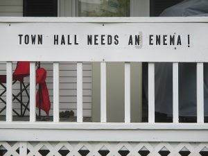 Mark Finneran lets his feelings about town hall be known via a sign on his house.