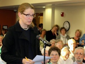 Architect Jill Neubauer speaks in opposition to the project to build a Marriot hotel on Main Street in Falmouth.