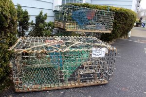 Traps for sale outside the Riverway Lobster House during the annual fisherman's yard sale.