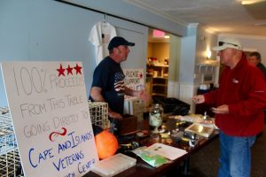 Scott Torrey, a commercial lobsterman out of Sandwich, brings lures and other objects he brings up in his lobster traps to raise money for the veterans outreach center.