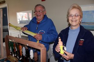Bob Davies and his wife, Mary, show off some of Bob's handmade lures.