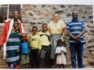 COURTESY KARA HOWARD Peace Corps volunteer Kara Howard poses with her Lesotho "family."