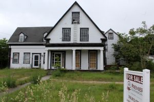 One of the historic sea captain's homes on Pleasant Street--abandoned and for sale.