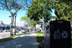 There are just two solar-powered recycling bins on Main Street in Falmouth.