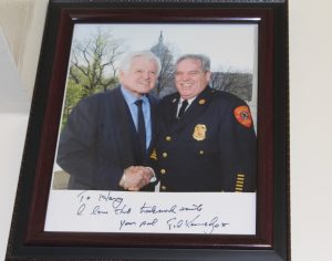 PHOTO COURTESY CHIEF BRUNELLE Chief Brunelle shaking the hand of his longtime friend, Senator Ted Kennedy.