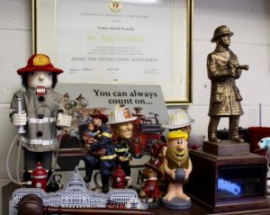 CAPE COD WAVE PHOTO A career's worth of firefighting memorabilia occupies a place of pride in the chief's office. 