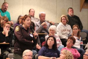 Barnstable Department of Natural Resources Officer Amy Croteau speaks at a meeting for people concerned about the potential closing of Cape Wildlife Center.