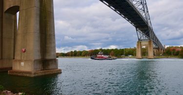 Bourne Bridge, tugboat & foliage