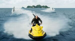 Jason Statham enjoys water sports in “Meg 2: the Trench.” (Warner Bros. Pictures)